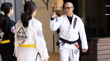 Martial arts instructor and students